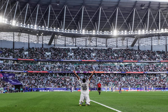 Aymen Hussein pictured celebrating after scoring two goals for Iraq in a 2-1 win over Japan at the AFC Asian Cup in January 2024